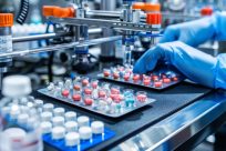 person-blue-gloves-working-machine